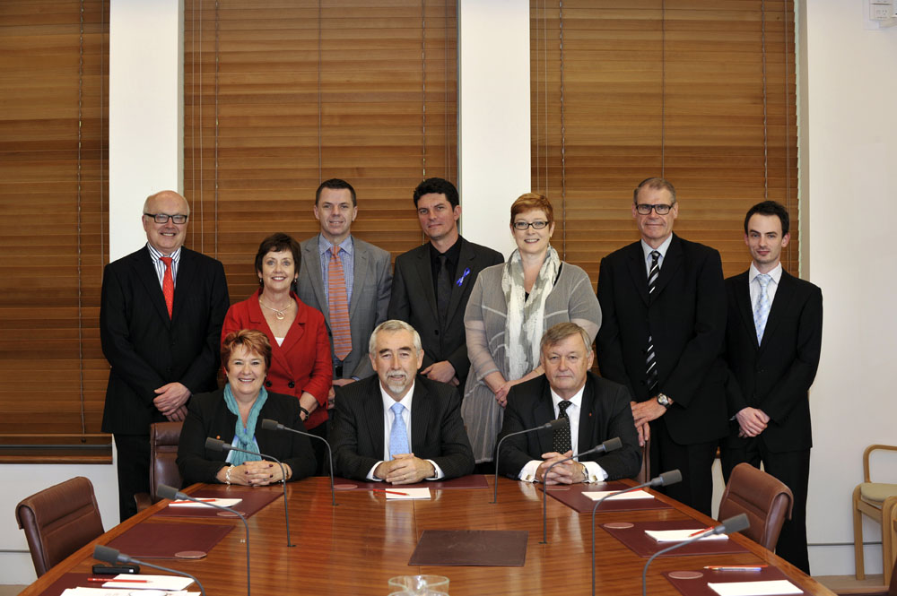 Members and staff of the Standing Committee of Privileges, 29 November 2012. Standing L-R: Senators George Brandis and Ursula Stephens, Richard Pye [Secretary], Senators Scott Ludlam, Marise Payne and John Faulkner, and Glenn Ryall [Research Officer]. Seated L-R: Senators Anne Urquhart, Gary Humphries [Chair] and Alex Gallacher [Deputy Chair]. DPS Auspic.
