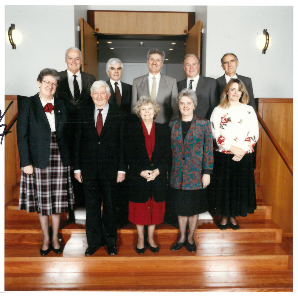 Members and staff of the Standing Committee of Privileges farewelling retiring Senators Peter Durack, Patricia Giles and Janet Powell, 1993. Back row L-R: Senators John Herron, John Coates, Bruce Childs, Baden Teague [Deputy Chair] and Barney Cooney. Front row L-R: Anne Lynch [Secretary], Senators Peter Durack [former Deputy Chair], Patricia Giles [Chair] and Janet Powell, and Colleen Cameron [Research Officer]. DPS Auspic.