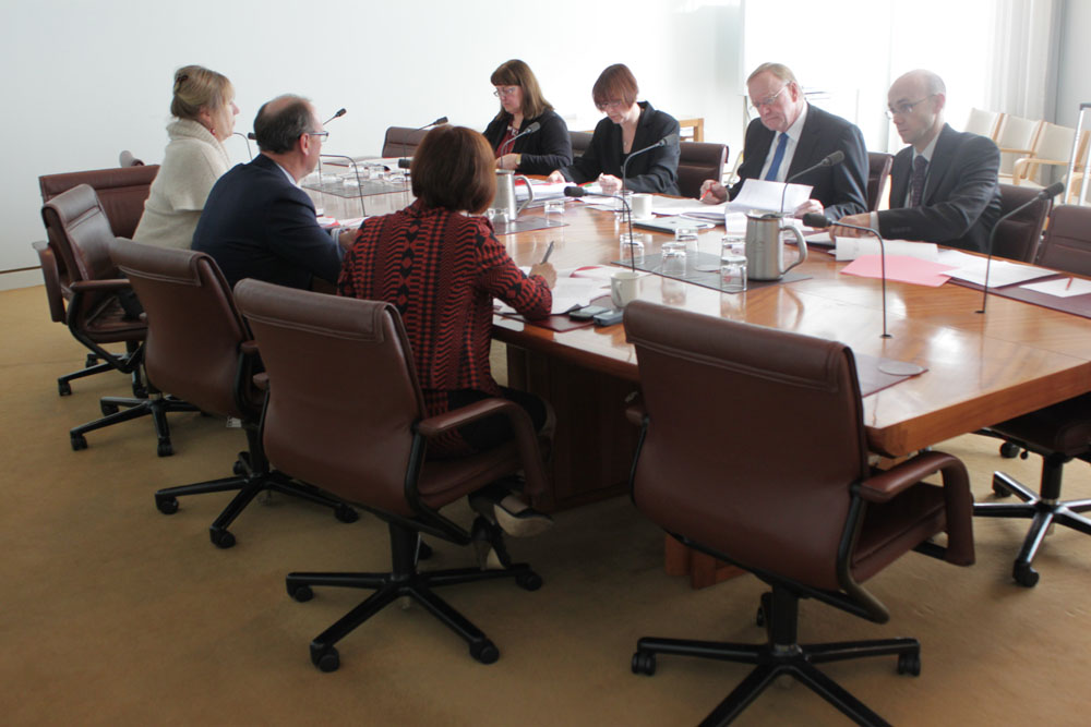 Scrutiny of Bills Committee  in session, 26 June 2013. Facing camera L-R: Ingrid Zappe [Legislative Research Officer], Toni Dawes [Secretary], Senator Ian Macdonald [Chair] and Leighton McDonald [Legal Adviser]. Backs to camera L-R: Senators Lin Thorp, Sean Edwards and Rachel Siewert.