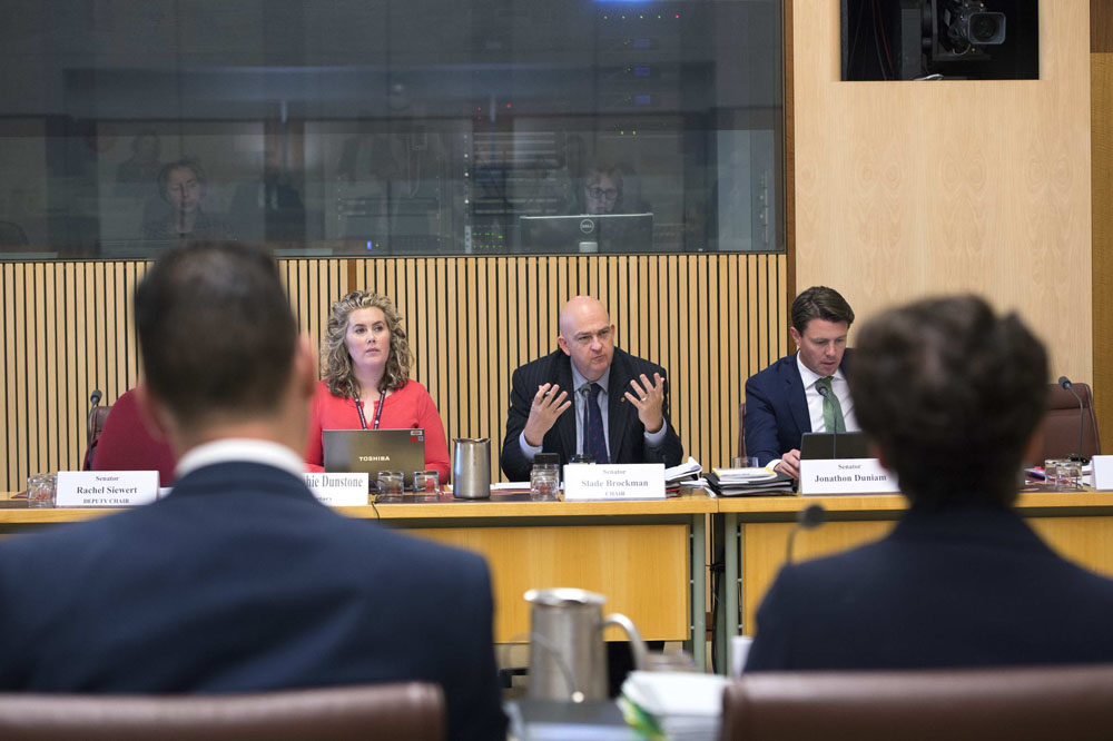 Community Affairs Legislation Committee chair Senator Slade Brockman questioning witnesses, 25 October 2017. L-R: Sophie Dunstone [Secretary], Senators Slade Brockman [Chair] and Jonathon Duniam. DPS Auspic.