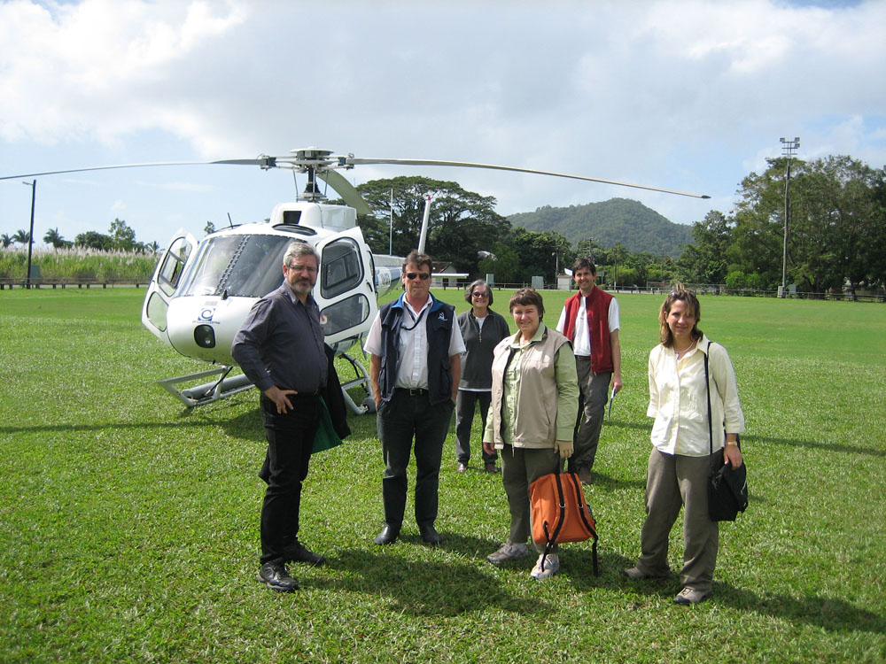 Environment, Communications, Information Technology and the Arts Committee members at Mossman, Queensland, 29 June 2006. L-R: Senator Andrew Bartlett [Chair], the helicopter pilot, Senator Claire Moore and Judith Adams [Deputy Chair], Dr Ian Holland [Secretary] and Senator Dana Wortley.