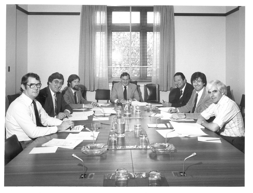 Standing Committee on Finance and Government Operations, 28 October 1981. L-R: Senators Peter Walsh and Austin Lewis, Tim Mackey [Secretary], Senators Peter Rae [Chair], Reg Withers, Bruce Childs and John Coates.