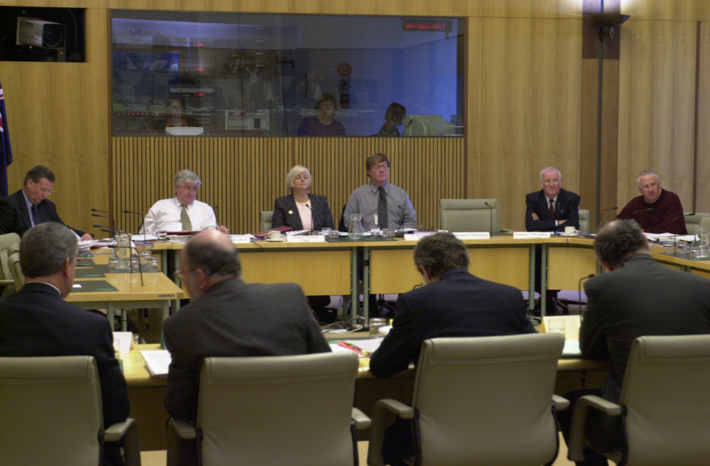 Rural and Regional Affairs and Transport Legislation Committee hearing evidence from officers from the Department of Agriculture, Fisheries and Forestry and related agencies at a budget estimates hearing, 28 May 2001. Seated facing camera L-R: Senators Kerry O'Brien, Michael Forshaw [Deputy Chair] and Jeannie Ferris [Acting Chair], Andrew Snedden [Secretary], Senators John Woodley and Shayne Murphy. DPS Auspic. 