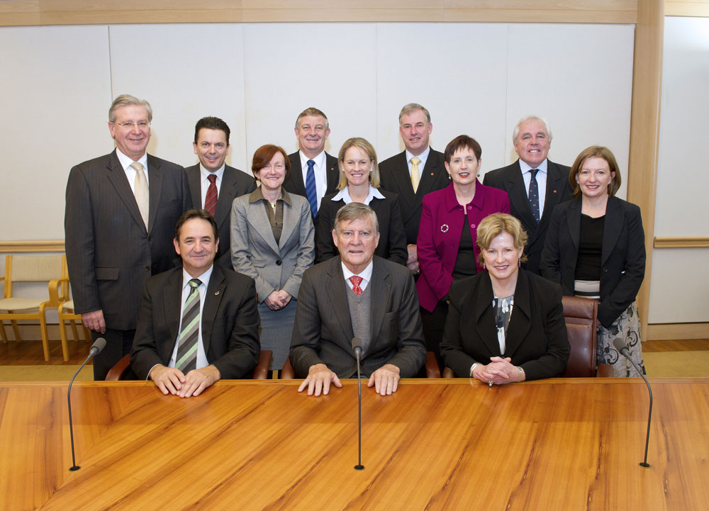 Rural Affairs and Transport Legislation and References committee members, 22 June 2011. Standing L-R: Senators Kerry O'Brien, Nick Xenophon, Rachel Siewert, Christopher Back, Fiona Nash and Richard Colbeck, Trish Carling [Research Officer], Senator Steve Hutchins and Jeanette Radcliffe [Secretary]. Seated L-R: Senators Glenn Sterle [Deputy Chair, References], Bill Heffernan [Chair, References] and Christine Milne. DPS Auspic. 