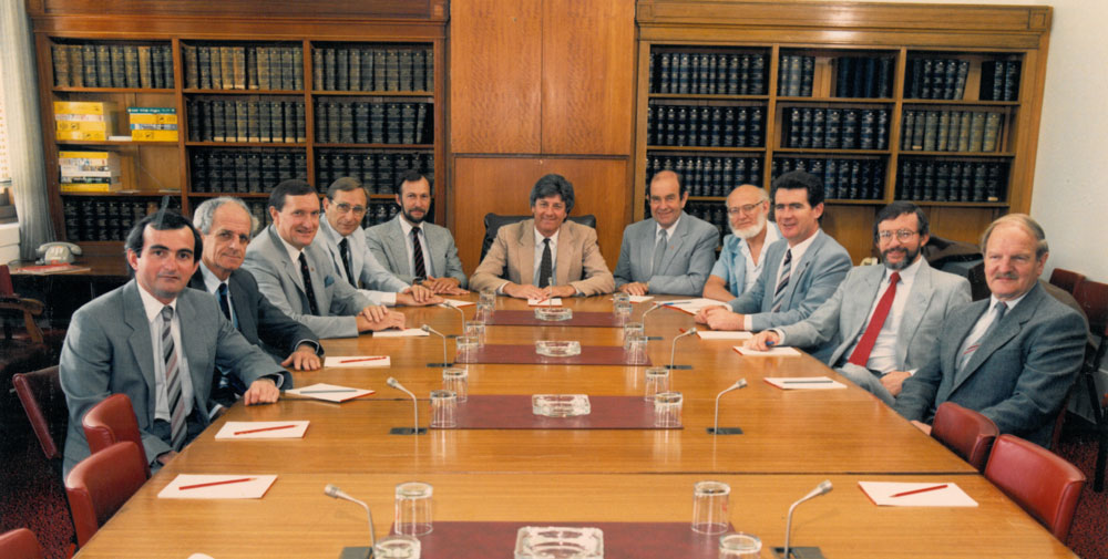 Left to right: Left to right: Mr D Drinkwater [Research Officer], Senator Bryant Burns, Senator David Brownhill, Senator Peter Baume, Mr P Keele [Secretary], Senator Bruce Childs [Chair], Senator Brian Archer, Senator John Coulter, Senator James McKiernan, Senator Peter Cook, Mr M Game [Research Officer].