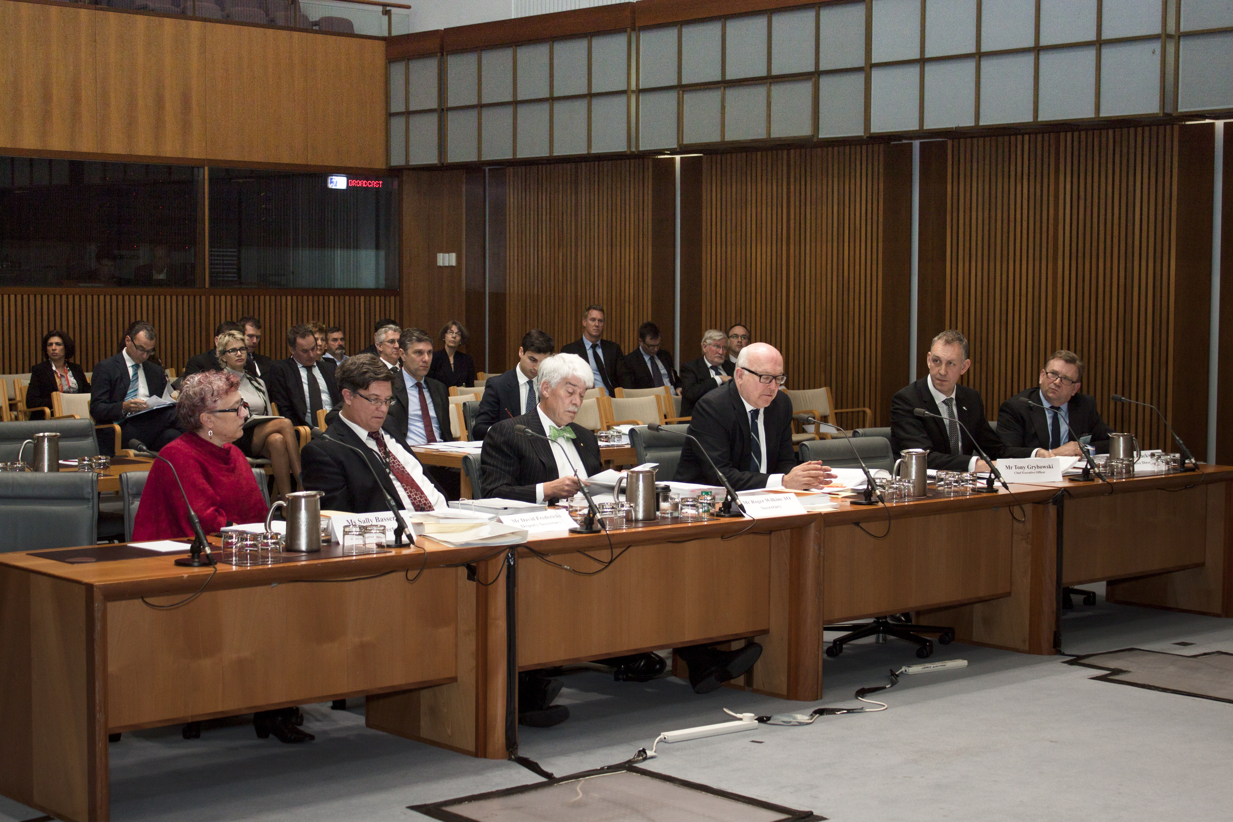 \x3cp\x3eBudget estimates hearing, 28 May 2014. L-R: Witnesses Sally Basser [Executive Director, Ministry for the Arts], David Fredericks [Deputy Secretary, Civil Justice and Legal Services Group, Attorney-General\'s Department], Roger Wilkins [Secretary, Attorney-General\'s Department], Senator George Brandis [Attorney-General, Minister for the Arts], Tony Grybowski [CEO, Australia Council] and Tim Blackwell [Executive Director, Corporate Resources, Australia Council].\x3c/p\x3e