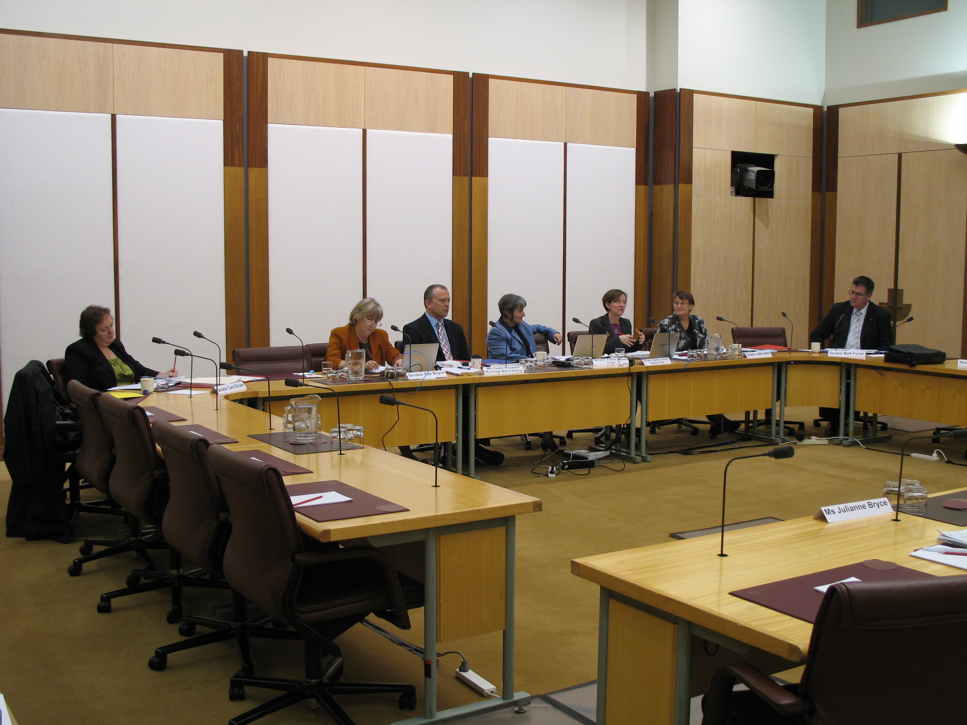 \x3cp\x3eCommunity Affairs Legislation Committee hearing evidence from witnesses at a public hearing of its inquiry into the Health Legislation Amendment (Midwives and Nurse Practitioners) Bill 2009 and two related Bills, 6 August 2009. L-R: Senators Carol Brown and Sue Boyce, Ivan Powell [Acting Secretary], Senators Claire Moore [Chair], Rachel Siewert [Deputy Chair], Judith Adams and Mark Furner. DPS Auspic.\x3c/p\x3e