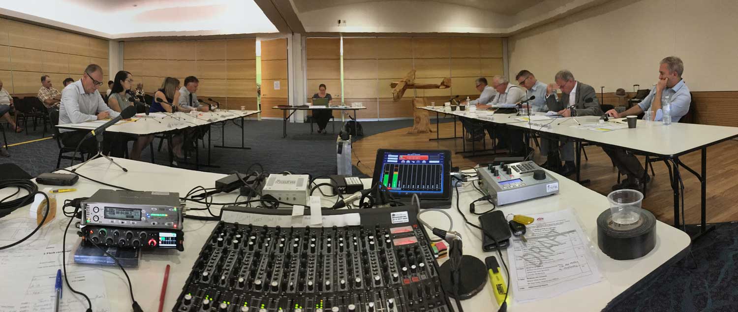 \x3cp\x3eRepresentatives from Mount Isa City Council appear before the Rural and Regional Affairs and Transport References Committee, 12 April 2018. L-R at table on right: Senators Rex Patrick and Barry O\'Sullivan [Acting Chair], Tim Watling [Acting Committee Secretary] and Senators Richard Colbeck and Anthony Chisholm. Image courtesy of Parliamentary Broadcasting.\x3c/p\x3e