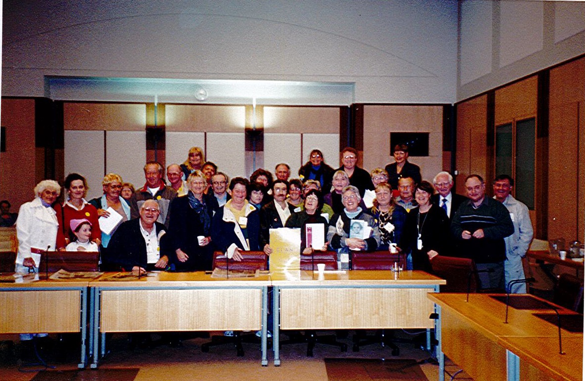 \x3cp\x3eCare leavers at a press conference where they were able to ask questions of senators following the tabling of the Forgotten Australians report, Parliament House, 30 August 2004. CLAN co-founder, Dr Joanna Penglase holds a copy of the report. Image courtesy of Leonie Sheedy, CLAN.\x3c/p\x3e