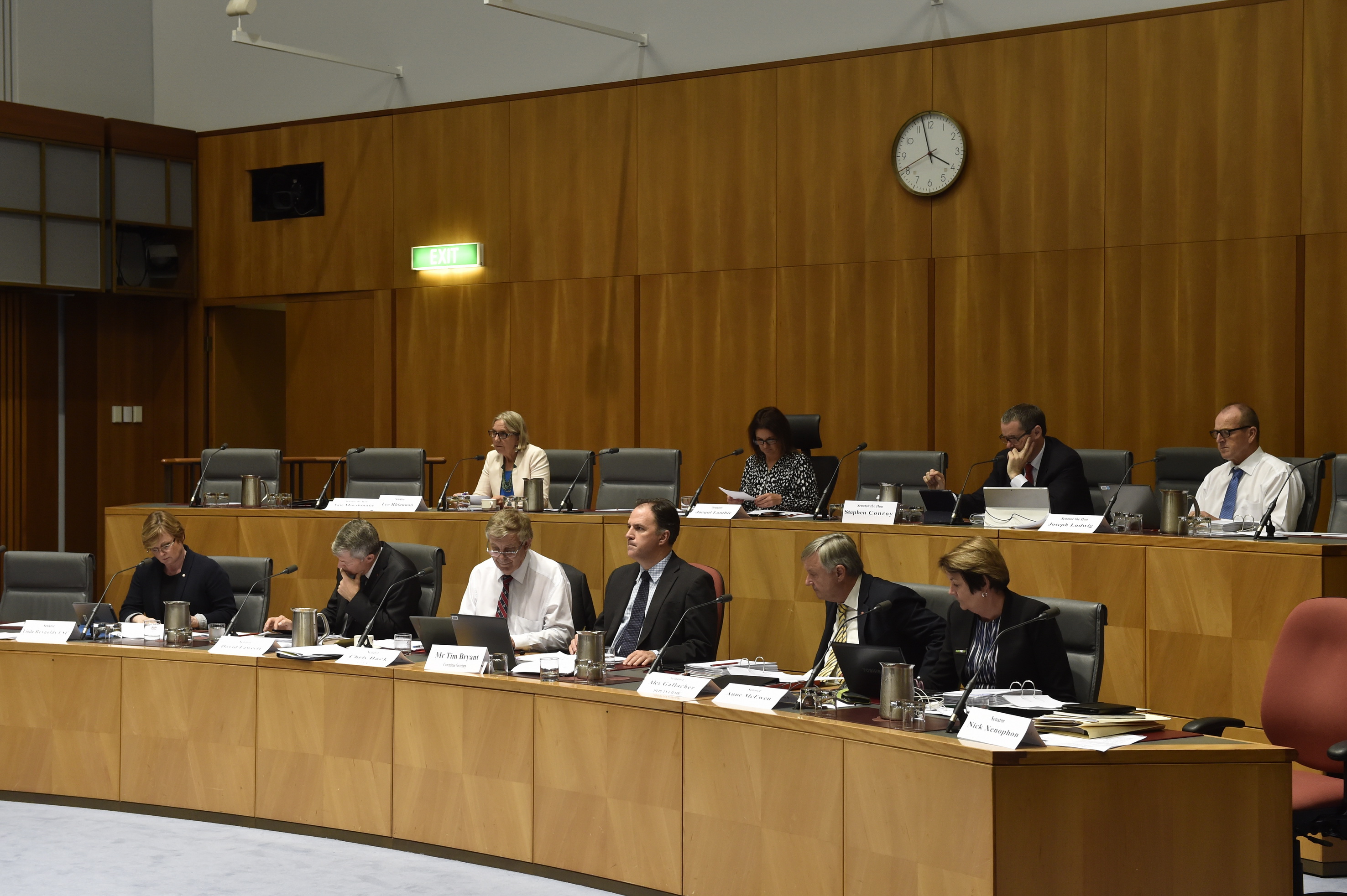 \x3cp\x3eForeign Affairs, Defence and Trade Legislation Committee additional estimates hearing, 10 February 2016. Top row L-R: Senators Lee Rhiannon, Jacqui Lambie, Stephen Conroy and Joe Ludwig. Bottom row L-R: Senators Linda Reynolds, David Fawcett and Chris Back [Chair], Tim Bryant [Secretary], Senators Alex Gallacher [Deputy Chair] and Anne McEwen. DPS Auspic.\x3c/p\x3e
