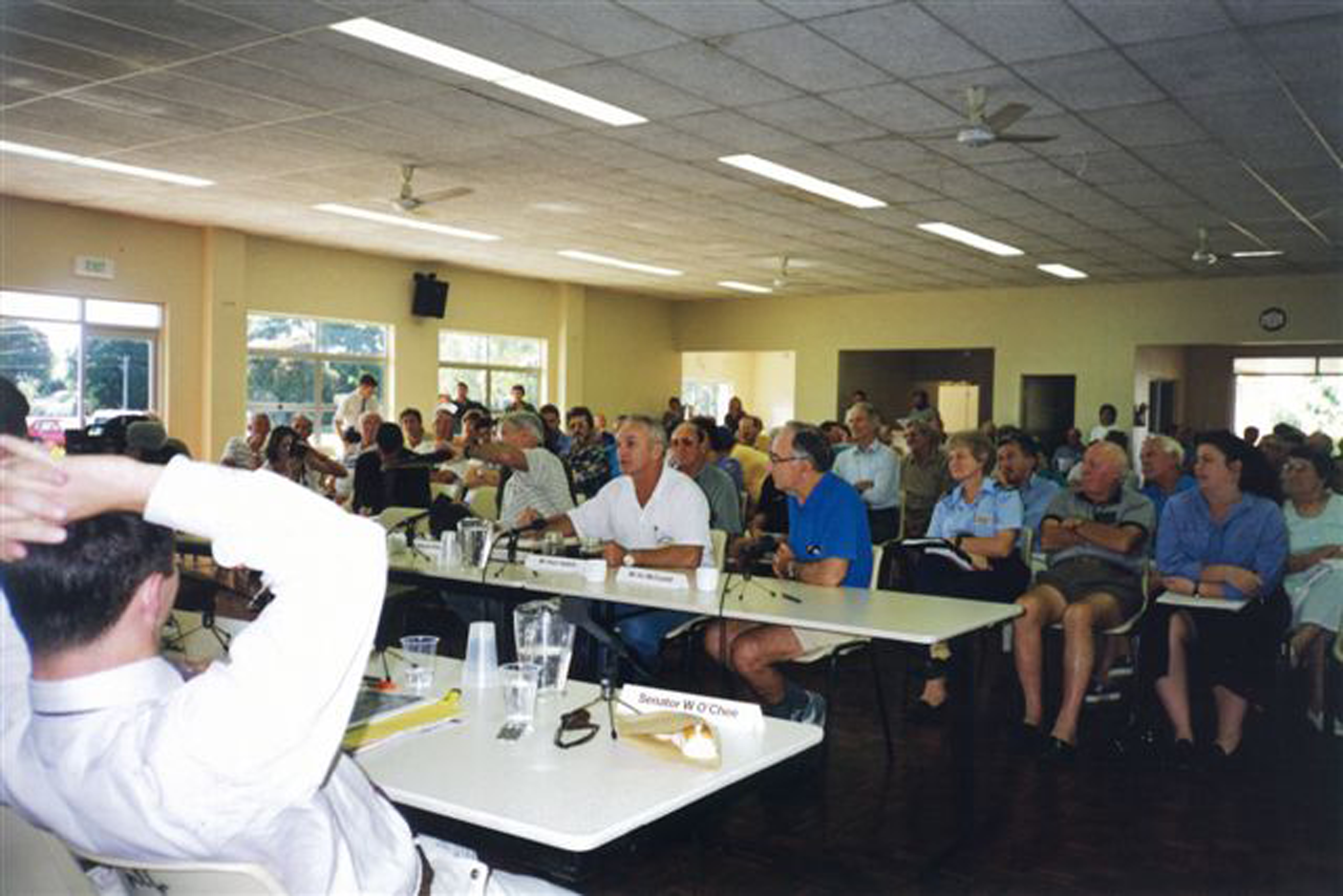 \x3cp\x3eWitnesses and audience at a Cardwell hearing of the commmittee, July 1998.\x3c/p\x3e