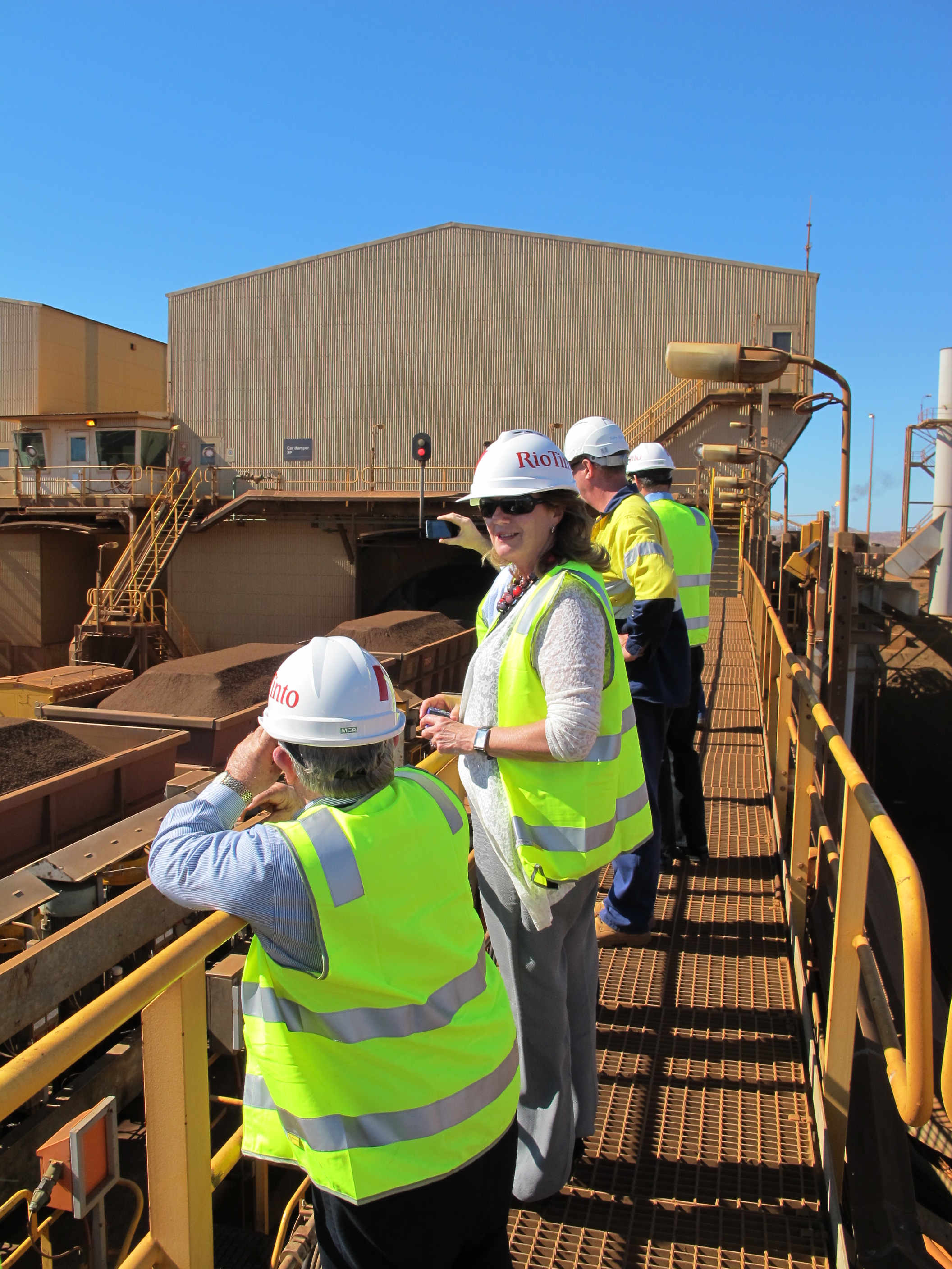 \x3cp\x3eCommittee members inspecting trains delivering iron ore extracted from mines in the Pilbara region to the Rio Tinto site at Dampier, 23 April 2013. \x3c/p\x3e