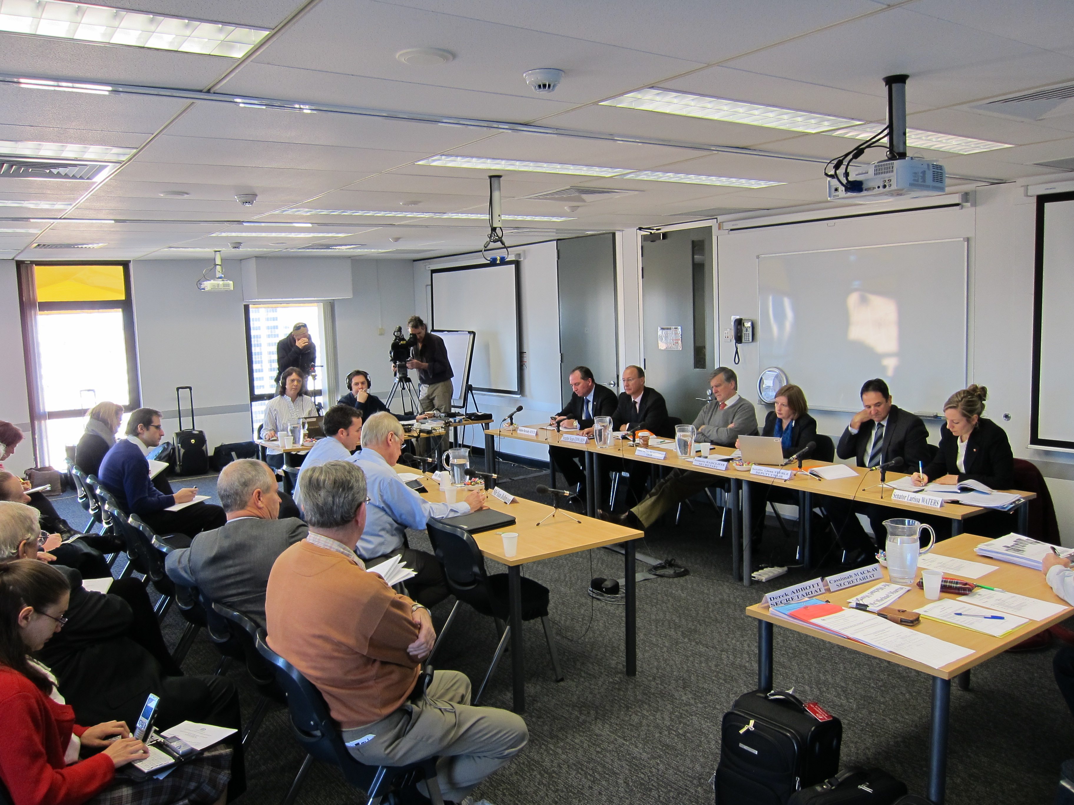 \x3cp\x3eHearing at Brisbane, 20 July 2011. Facing camera L-R: Senators Barnaby Joyce, Sean Edwards and Bill Heffernan [Chair], Jeanette Radcliffe [Committee Secretary], Senators Glenn Sterle and Larissa Waters.\x3c/p\x3e