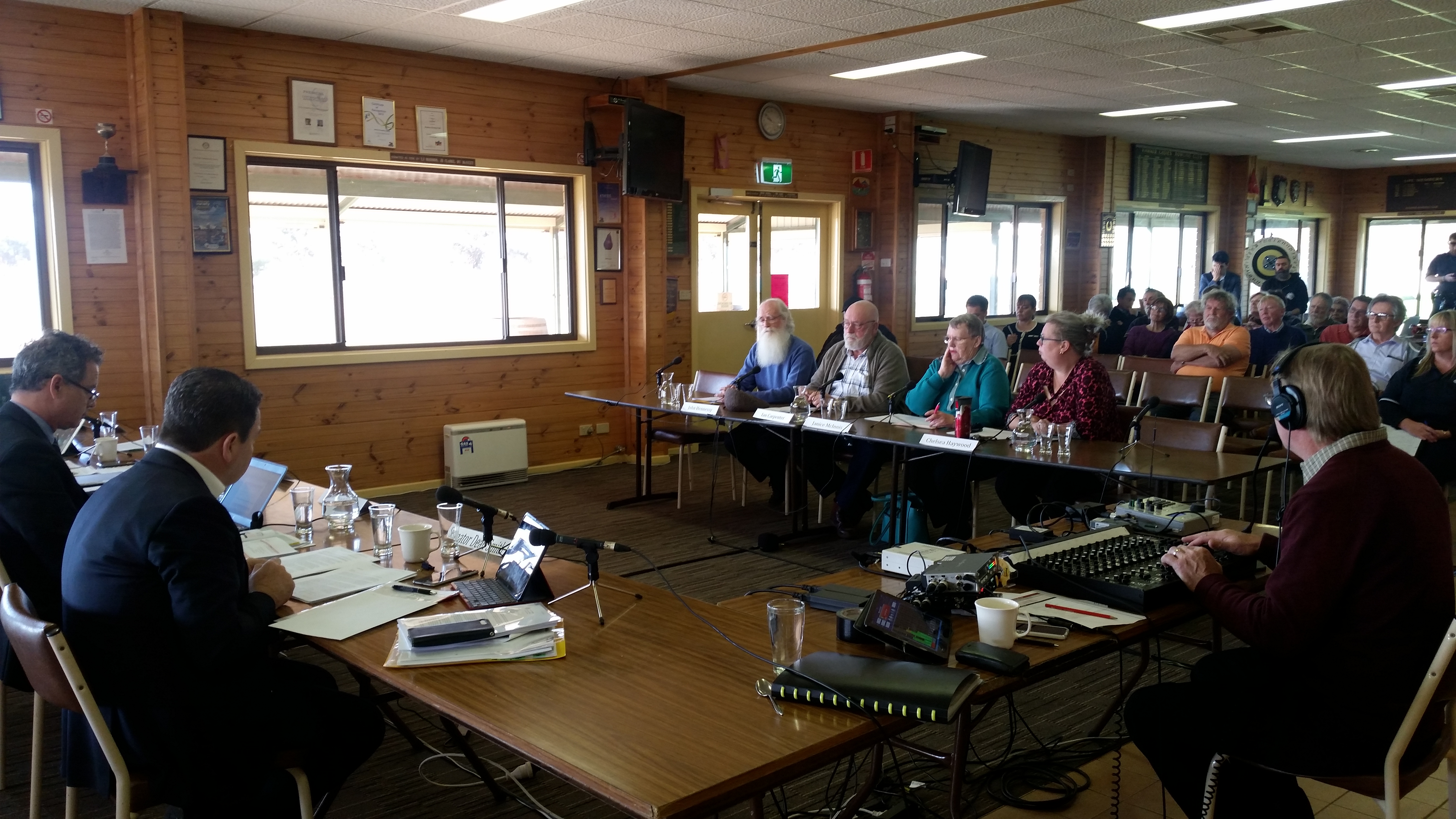 \x3cp\x3eRepresentatives of the Hawker Community Development Board at a public hearing at Hawker, SA, 6 July 2018. L-R facing camera: John Hennessy, Ian Carpenter, Janice McInnes and Chelsea Haywood.\x3c/p\x3e