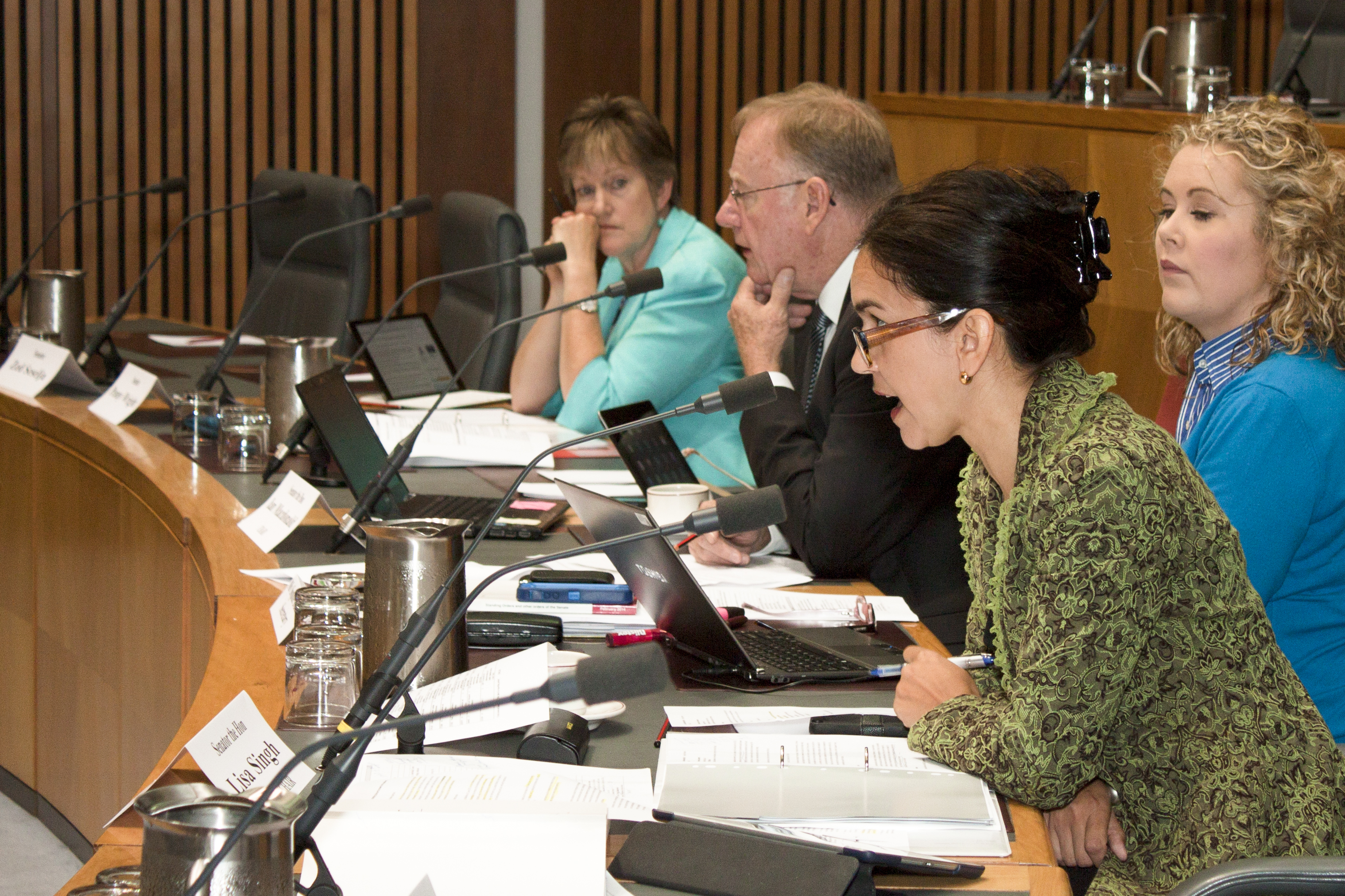 \x3cp\x3eBudget estimates hearing, 28 May 2014. L-R: Senators Penny Wright, Ian Macdonald [Chair] and Lisa Singh [Deputy Chair], Sophie Dunstone [Secretary] (seated behind Senator Singh).\x3c/p\x3e