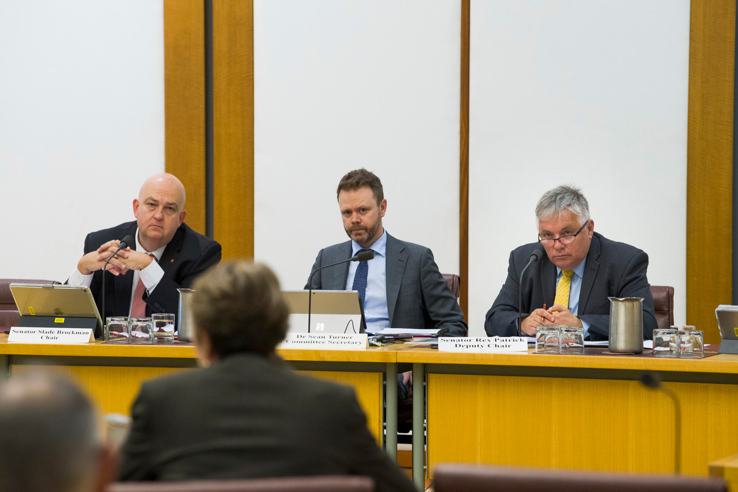 L-R: Senator Slade Brockman, [Chair], Sean Turner [Committee Secretary] and Senator Rex Patrick [Deputy Chair].