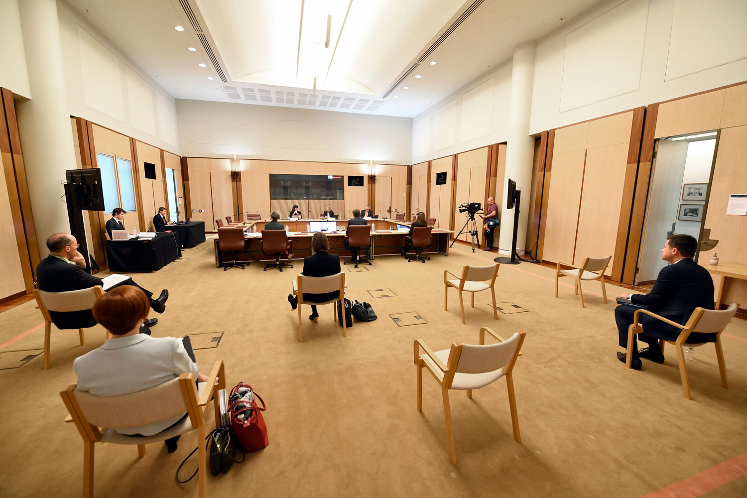 Treasury officials exercising social distancing at the Select Committee on COVID-19 hearing, 28 April 2020. DPS Auspic.